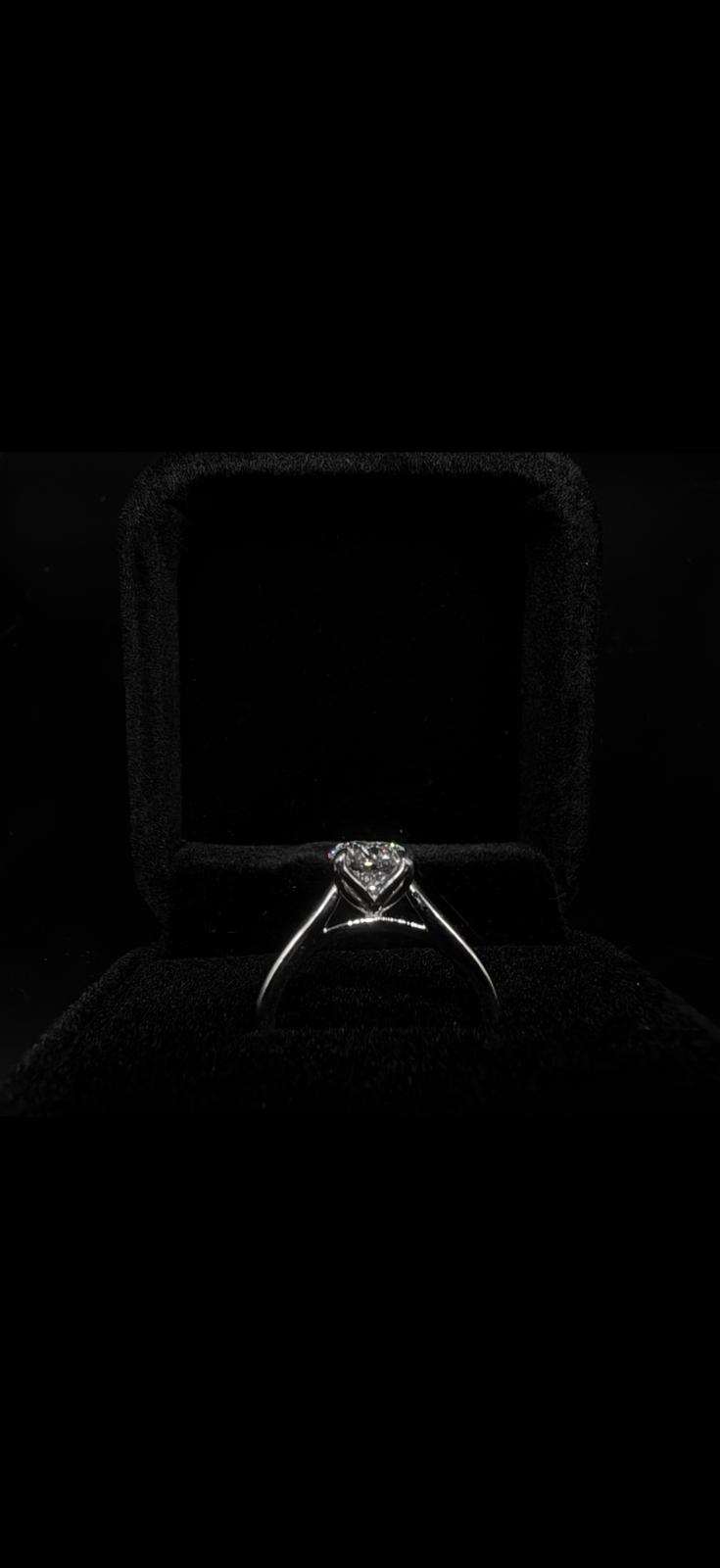 Finished round platinum ring in a presentation box